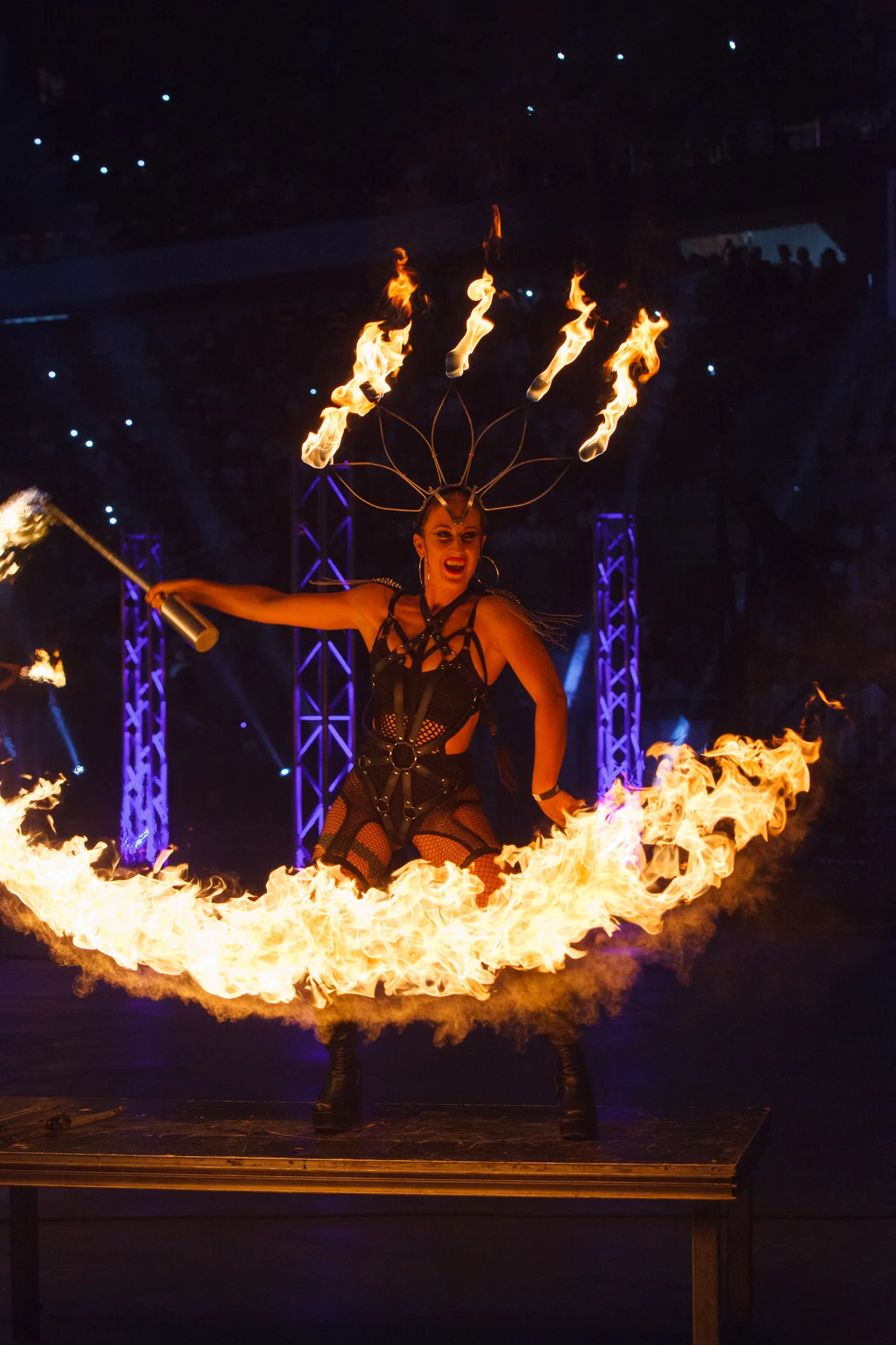 Sereia performing a dragon staff fire act